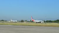 Port-au-Prince International Airport (Toussaint Louverture Int'l), Port-au-Prince Haiti (MTPP) - Aircrafts American Airlines and Dominican Wings - by Jonas Laurince