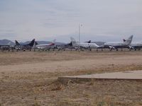 Kingman Airport (IGM) - Stored aircraft - by Keith Sowter