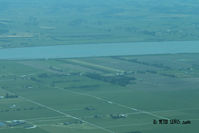 Ruawai Aerodrome - Photo taken from 2000' AMSL on a hazy day - by Peter Lewis