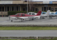 San Carlos Airport (SQL) - Line-up of locally-based Cirrus SR20 + SR22 aircraft @ San Carlos Airport, CA (viewed facing east)  - by Steve Nation
