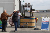 Santa Paula Airport (SZP) - Santa Paula Airport Aviation Museum Featured Aircraft-N157LB 2001 Lindstrand 90A HOT AIR BALLOON *Starlite*, Moderator David Watson with lady owner/pilot comments on the balloon operation/functioning. She also Chairwoman of local 99s. - by Doug Robertson