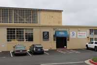 Camarillo Airport (CMA) - Channel Islands Aviation work hangar. This hangar goes back to Oxnard Air Force Base here before Camarillo was a city. Federal GSA gave air base to Ventura County in 1976. USAF base closed 1971. Some USAF bldgs razed. Now new FAA tower. - by Doug Robertson