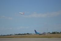 Port-au-Prince International Airport (Toussaint Louverture Int'l) - Aircraft American Airlines take off while Latin Wing waiting for .. - by Jonas Laurince