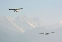 Innsbruck Airport - Towing a glider out off LOWI, Innsbruck with the austrian alps in the background - by Paul H