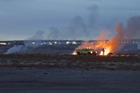 Boise Air Terminal/gowen Fld Airport (BOI) - Early morning burning of piles of tumbleweeds that collect on the airport. When the wind blows they become a FOD hazard. - by Gerald Howard