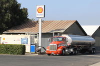 Santa Paula Airport (SZP) - Santa Paula Airport self-serve SHELL AVIATION 100LL fuel dock, being refueled by tanker. Location: Midfield North. No subsequent price change as of several hours later photo taken..  - by Doug Robertson