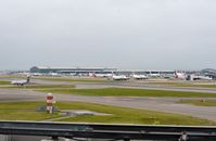 London Heathrow Airport - View toward Terminal 5 in the distance with part of T3 to the right. - by FerryPNL
