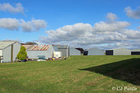 Dunkeswell Aerodrome Airport, Honiton, England United Kingdom (EGTU) - A section of the many hangars scattered about at Dunkeswell. - by Clive Pattle