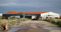 Dunkeswell Aerodrome Airport, Honiton, England United Kingdom (EGTU) - Old hangars on north side of Dunkeswell airfield now used as commercial/industrial premises - by Clive Pattle