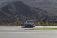 Santa Paula Airport (SZP) - Refueling Helicopter N454WT at SZP Helipad. Phone number to call is at the helipad. - by Doug Robertson