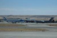 Boise Air Terminal/gowen Fld Airport (BOI) - Air Force One taxiing out past C-17A support aircraft. - by Gerald Howard