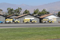Santa Paula Airport (SZP) - Santa Paula Fire Department Fire Trucks, in-service training going on at the airport - by Doug Robertson