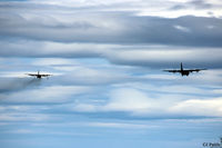 RAF Lossiemouth - Final approach to RAF Lossiemouth - Hercules C5 ZH881 leads a smoking Hercules C3 XV295 - by Clive Pattle