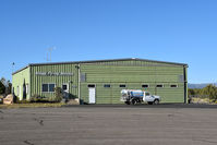 Animas Air Park Airport (00C) - Gregg Flying service hangar at Animas Air Park airport, Durango CO - by Jack Poelstra