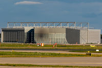 Frankfurt International Airport - A 380 maintenance building.
The dark spot is from a MD 11 engine test! - by Uwe Zinke