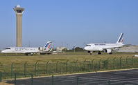 Paris Charles de Gaulle Airport (Roissy Airport), Paris France (LFPG) - F-GRJT - Air France (Brit Air) CRJ 200 and F-GRHR - Air France Airbus A319 - by Wilfried_Broemmelmeyer