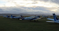 Dundee Airport, Dundee, Scotland United Kingdom (EGPN) - Sunset line-up of Tayside Aviation trainers - by Clive Pattle