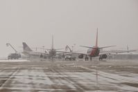 Boise Air Terminal/gowen Fld Airport (BOI) - Three airliners trying to de ice at their gates at the same time. - by Gerald Howard