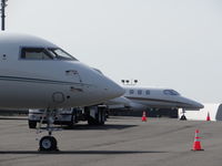 Westchester County Airport (HPN) - BizJets on the ramp - by Haldan Dickinson